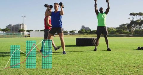 Performing outdoor dumbbell shoulder presses on grass with tire and data chart overlay