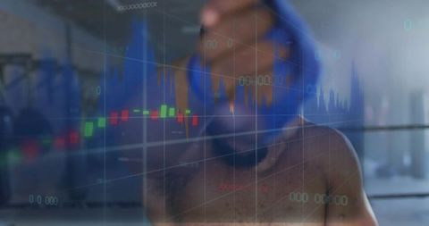Shirtless boxer reaching toward camera wearing blue headwrap with candlestick market data overlay