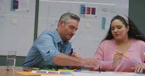 Colleagues collaborating in creative design process