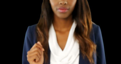 Confident Businesswoman Engaged with Virtual Screen Technology