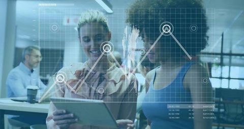 Coworkers collaborating in modern office with graph overlay