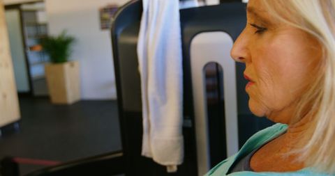 Middle-Aged Woman Resting in Modern Clinic with Copy Space