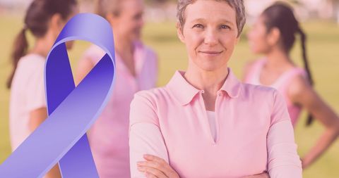Confident woman supporting cancer awareness with violet ribbon