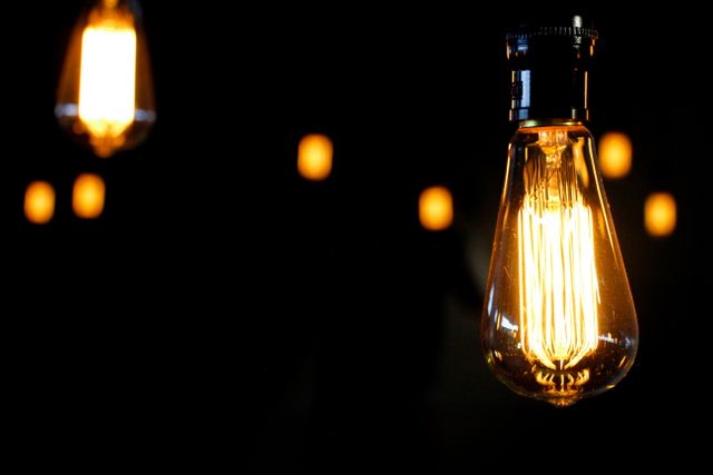 Vintage Edison Bulb Glowing in Dark Environment - Download Free Stock Photos Pikwizard.com