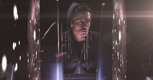 Image of multiple screens showing webs of connection over a Caucasian male hacker, wearing a hoodie, using a computer digital composite image
