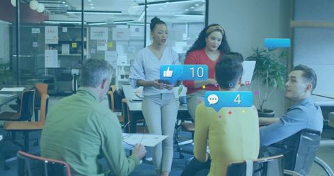 Diverse Team Collaborating in Modern Office With Digital Interactions