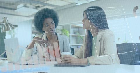 Diverse Businesswomen Discuss Financial Data in Modern Office - Download Free Stock Images Pikwizard.com