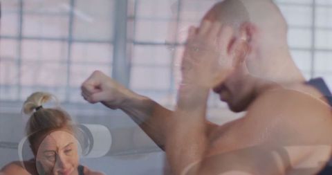 Boxing training with virtual coaching and partners in studio