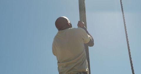 soldier climbing rope in outdoor obstacle course challenge - Download Free Stock Images Pikwizard.com