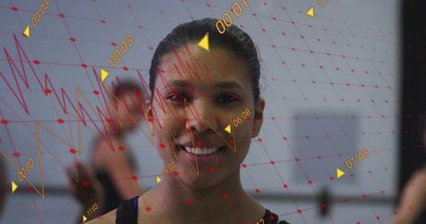 Smiling dancer wearing black tank top with timecode data overlay and energy grid