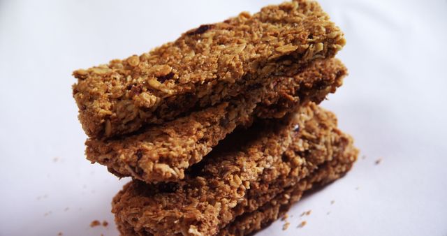 Stack of Crunchy Granola Bars on White Background - Download Free Stock Images Pikwizard.com