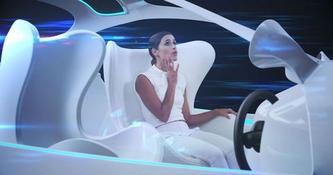 Woman relaxing in futuristic self-driving car through city