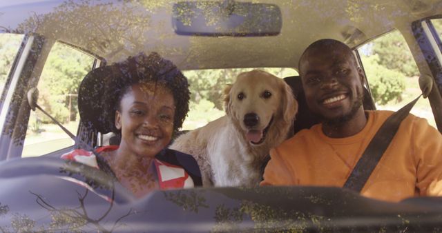 Couple enjoying a road trip with their dog, creating a joyful and adventurous atmosphere. Perfect for promoting travel, pet-friendly products, family activities, and outdoor adventures. Useful in advertisements and articles focused on travel, pet ownership, and lifestyle.