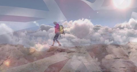 Solo female hiker trekking rugged mountain ridge scenery