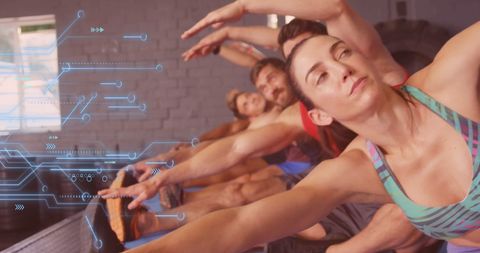 Group Stretching with Digital Overlay at Gym Embracing Tech-Fitness Concept