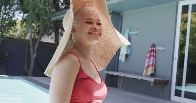 Smiling Young Woman in Swimwear by Poolside on Sunny Day - Download Free Stock Images Pikwizard.com