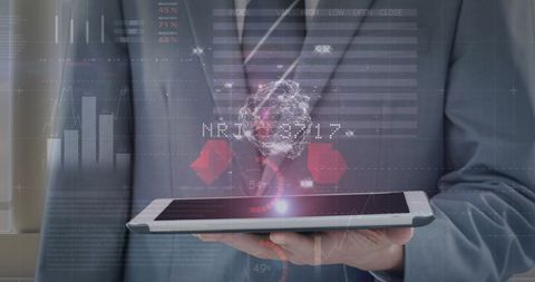 Businessman Using Tablet with Holographic Financial Data - Download Free Stock Images Pikwizard.com