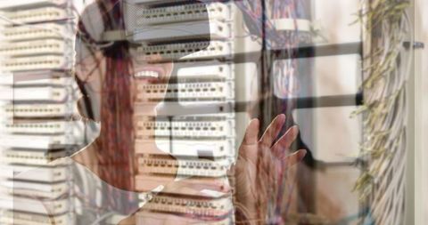 Woman Exploring Virtual Server Network with VR Headset