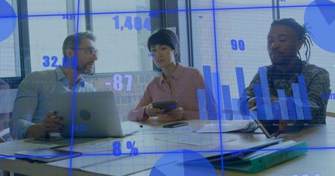 Diverse Team Working on Financial Data in Modern Office