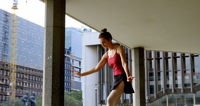 Elegant Ballerina Practicing Outdoors near Urban Architecture - Download Free Stock Images Pikwizard.com