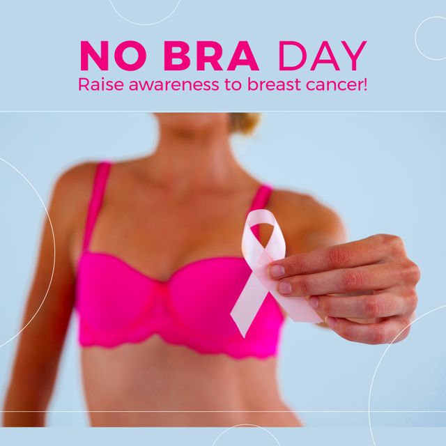 Image of no bra day on blue background and hands of caucasian woman and pink ribbon. No bra day, health and celebration concept.
