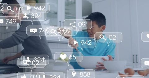 Chinese boy stirring batter with social media overlays in bright modern family kitchen