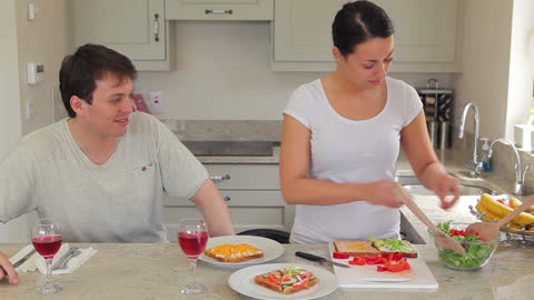 Couple Creating Healthy Meals Together in Kitchen