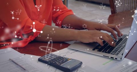 Businesswoman Typing on Laptop with Molecule Digital Overlay