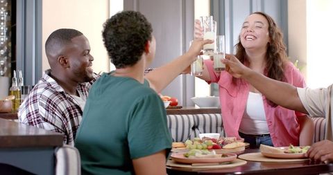 Diverse Friends Toasting Over Breakfast, Sharing Joyful Morning Gathering - Download Free Stock Images Pikwizard.com