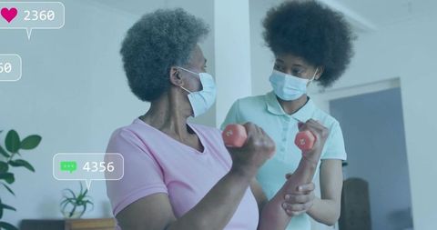 Masked Senior Woman Exercising with Supportive Therapist at Home