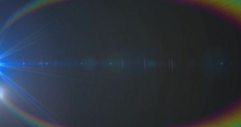 Blue-White Lens Flare with Starburst, Chromatic Rings and Horizontal Ghosts on Dark Field