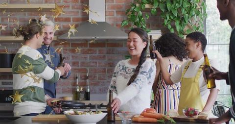 Smiling woman reaching for beer during lively modern kitchen gathering with friends