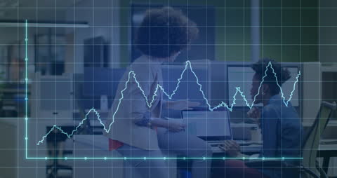 Colleagues Analyzing Financial Data with Graph Overlay in Office