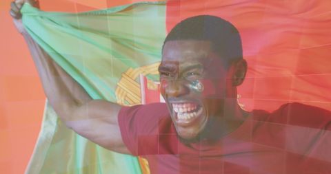 Energetic Supporter with Portugal Flag Celebrating