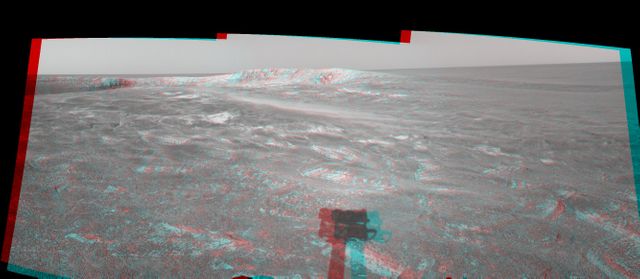This 3-D cylindrical-perspective mosaic was created from navigation camera images that NASA Mars Exploration Rover Spirit captured on on sol 108. 3D glasses are necessary to view this image.