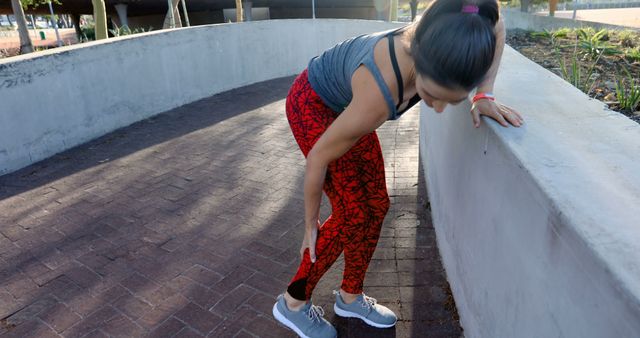 Woman Stretching Outside during Workout Session - Download Free Stock Images Pikwizard.com