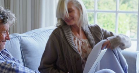 Happy Senior Couple Relaxing Indoors Together at Home - Download Free Stock Images Pikwizard.com