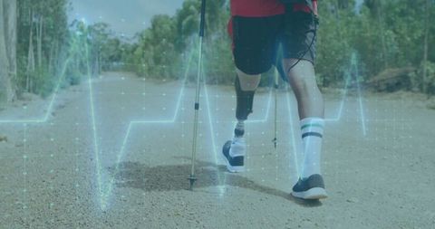 Man Walking with Prosthetic Leg on Nature Trail with Heartbeat Overlay