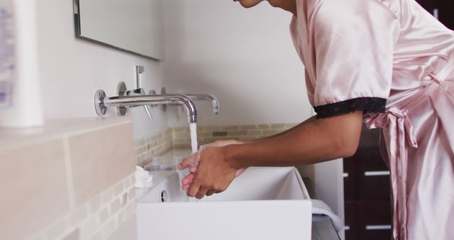 Person Washing Hands in Modern Bathroom - Download Free Stock Images Pikwizard.com