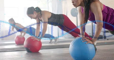 Women Exercising at Gym with Technology DNA Overlay