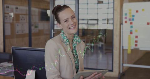 Confident Businesswoman Engaging with Digital Technology in Office