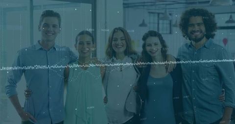 Vibrant Team Embracing Innovation in Modern Office Setting