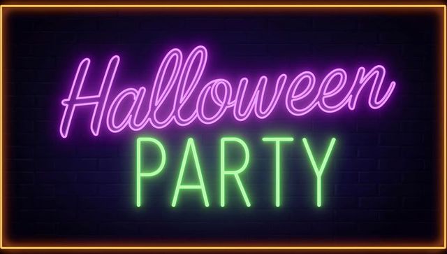 Neon halloween party sign glowing against brick wall