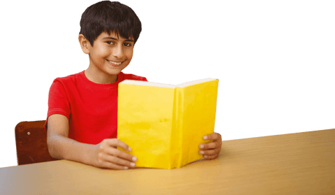 Smiling Boy Reading Transparent Book at Table - Download Free Stock Videos Pikwizard.com