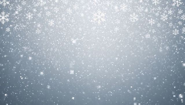 Soft blue winter snowfall with frosted snowflakes and sparkling bokeh backdrop