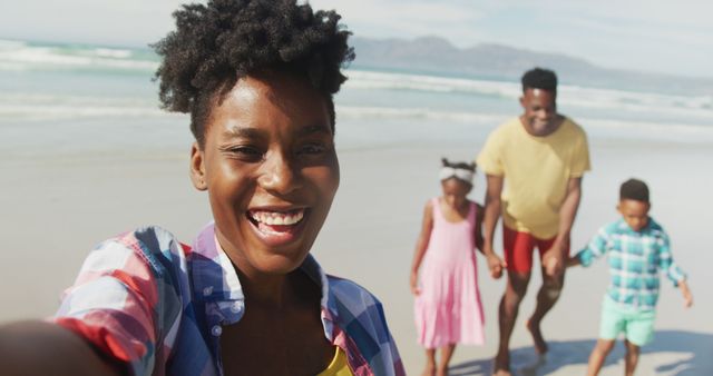 Happy African American Family Enjoying Day at the Beach - Download Free Stock Images Pikwizard.com