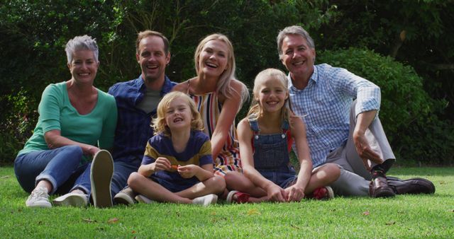 Multi-Generational Family Smiling Together in Garden - Download Free Stock Images Pikwizard.com