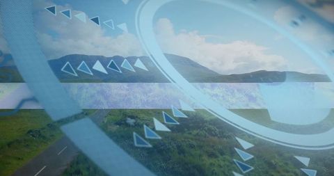 Displaying futuristic hud overlay on countryside road with circular rings and chevrons