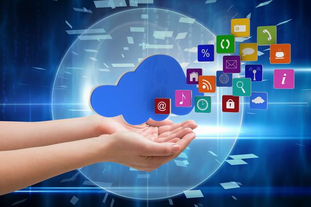 Hands holding cloud graphic with various digital app icons surrounding it, depicting cloud computing and digital services. Useful for illustrating concepts of online storage, cloud services, data management, and technology in business and education.