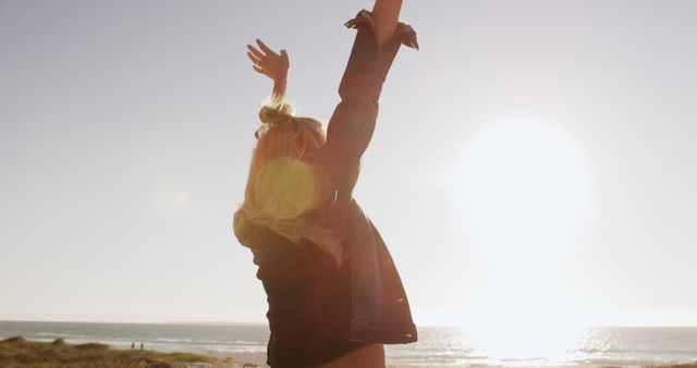 Woman Enjoying Sunlight at Beach - Download Free Stock Images Pikwizard.com